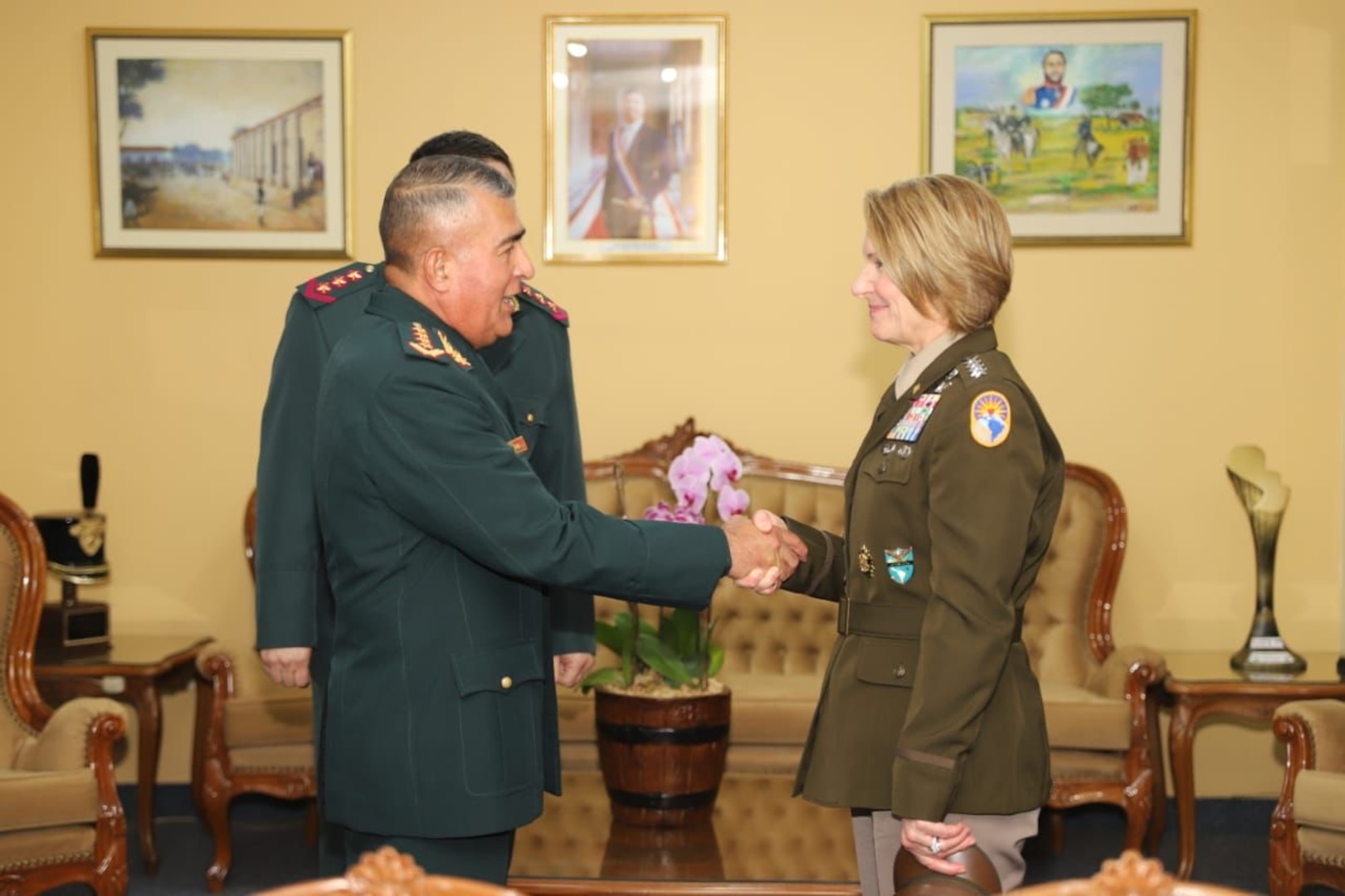 U.S. Army Gen. Laura Richardson is greeted by Paraguayan General EJ César Augusto Moreno Landaira.