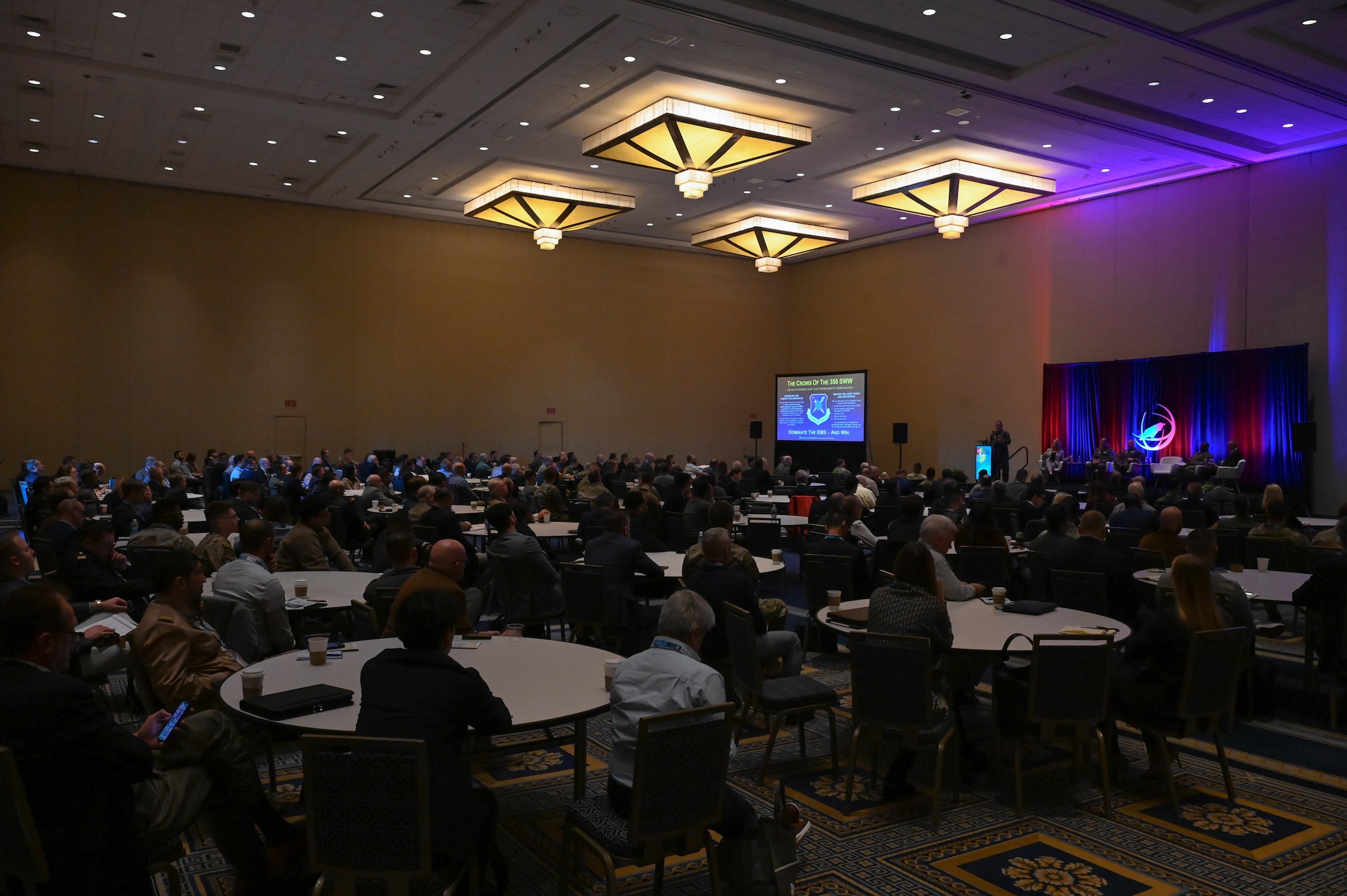 Attendees of the Association of Old Crows 2023 International Convention and Symposium attend a panel on Electronic Warfare acquisition hosted by U.S. Air Force leaders in National Harbor, MD, Dec. 12, 2023. The panel discussed the current and future EW needs by the U.S. Air Force by industry and Department of Defense partners. (U.S. Air Force photo by Capt. Benjamin Aronson)