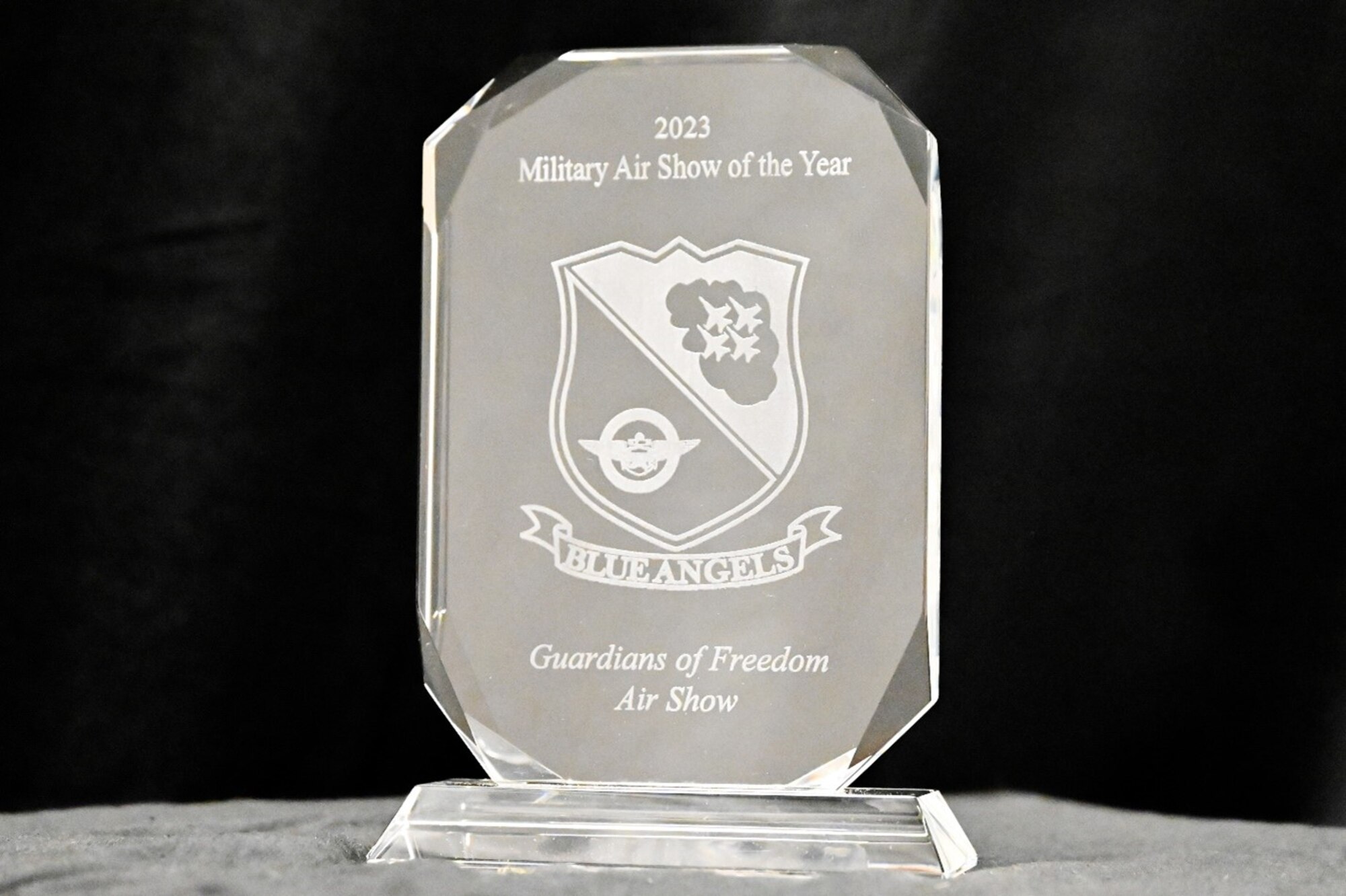 Glass plaque with etched text reading 2023 military air show of the year award. Guardians of Freedom Air Show."
