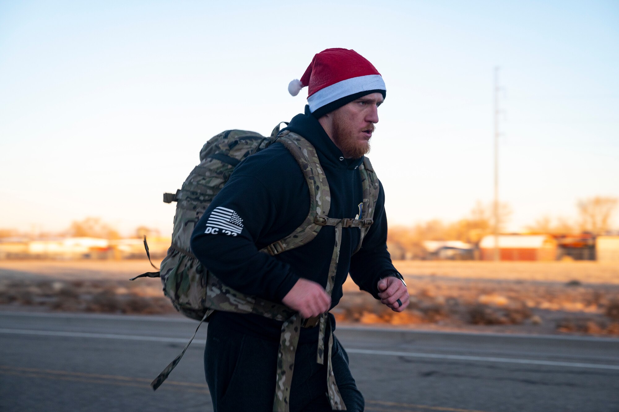 Man runs during ruck march.