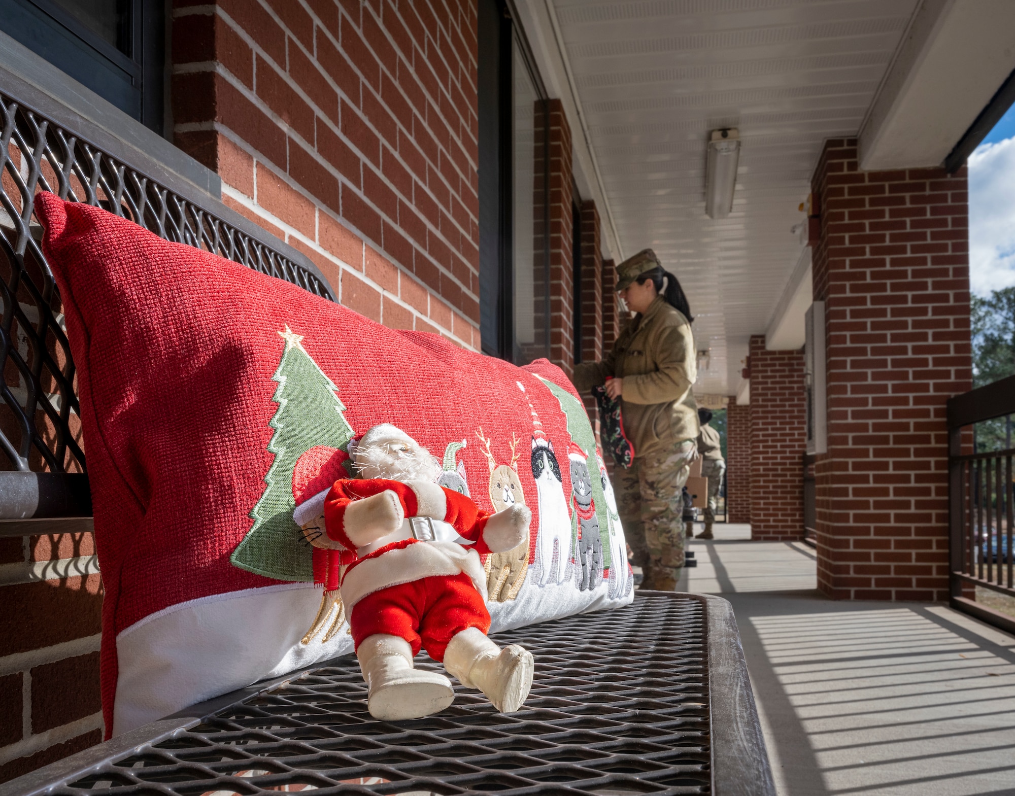 U.S. Air Force Master Sgt. Christina Howard, 4th Medical Group first sergeant, and other first sergeants assigned to the 4th Fighter Wing, distributes holiday gift bags at Seymour Johnson Air Force Base, North Carolina, Dec. 11, 2023. The Airmen cookie drive is an annual event coordinated by the Seymour Spouse’s Club and the first sergeants to help Airmen in the dorms feel at home for the holidays. (U.S Air Force photo by Senior Airman Sabrina Fuller-Judd)