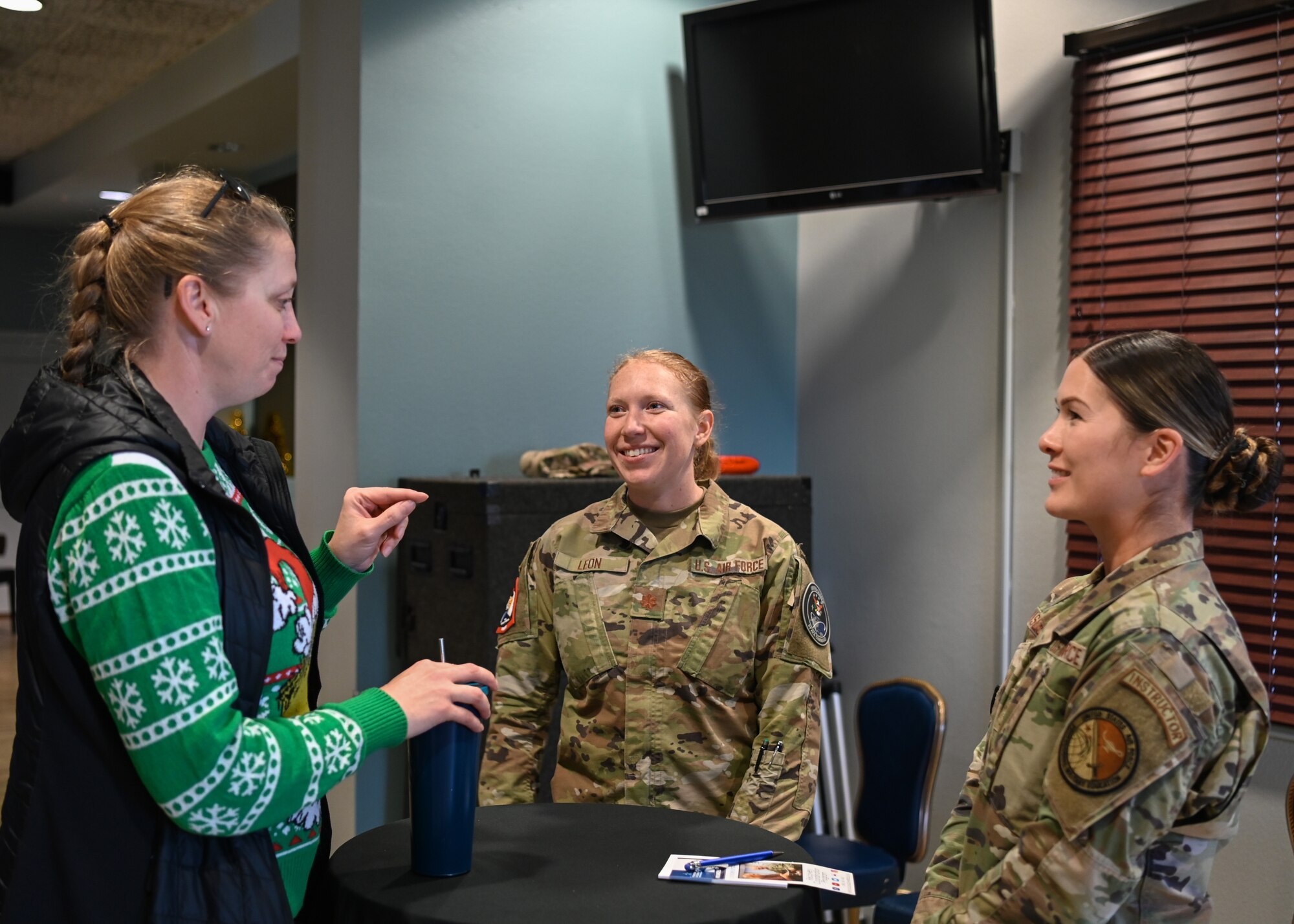 A Space Forces Space director of public affairs, and United States Air Force Master Sgt. Catherine Vasquez, Airman Leadership School commandant, speaks with a guest during the Women of Vandenberg Empowerment Network hosted a speed networking event at Vandenberg Space Force Base.