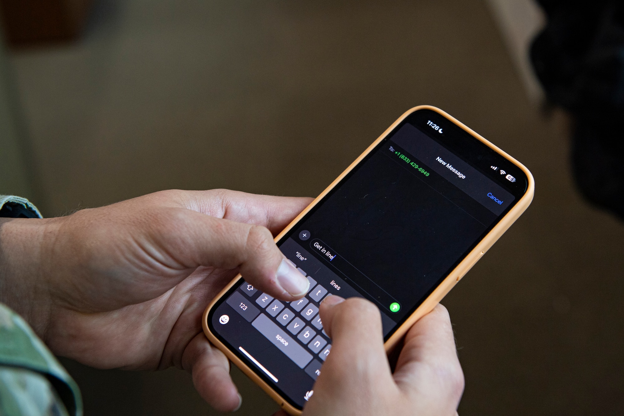 An Airman texts to activate prescription