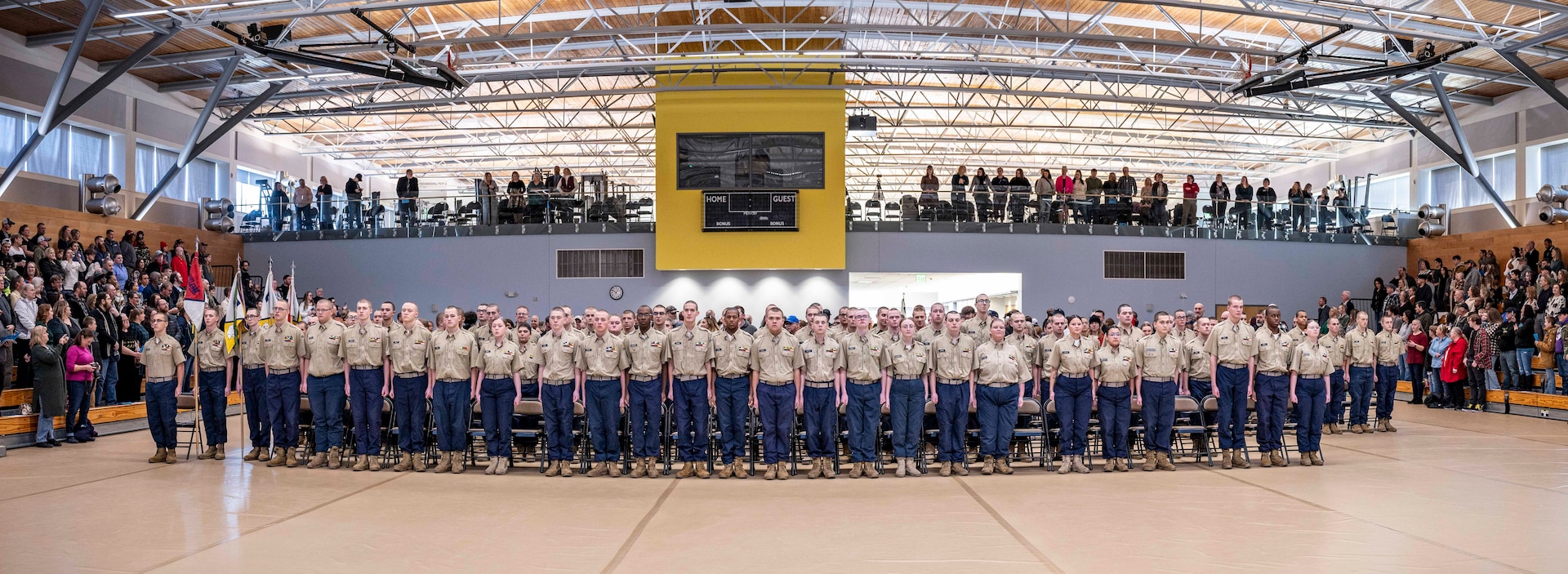 Cadets from Class 2-2023/Cycle 61 of the Mountaineer ChalleNGe Academy-North stand at attention during their graduation ceremony held at Camp Dawson, Kingwood, West Virginia, December 15, 2023. A total of 101 cadets graduated from the 22-week quasi military program, 66 graduating with a high school diploma. (U.S. Army National Guard photo by Edwin L. Wriston)