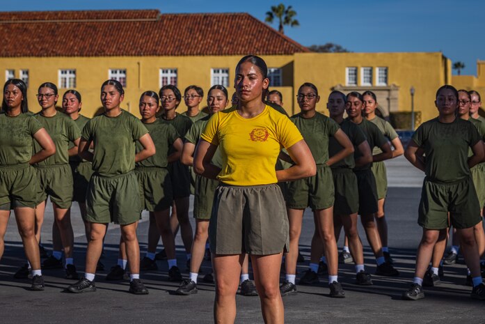 New U.S. Marines with Fox Company, 2nd Recruit Training Battalion, stand in formation after a motivational run at Marine Corps Recruit Depot San Diego, Dec. 14, 2023. The motivational run is the final training event new Marines complete before graduating, which consists of a three-mile run throughout the Depot. (U.S. Marine Corps photo by Lance Cpl. Jacob B. Hutchinson)