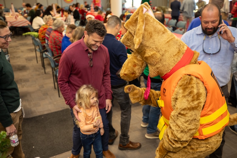 Bobber the Water Safety Dog made a surprise visit to the U.S Army Corps of Engineers (USACE) Galveston District (SWG) during the district's quarterly awards ceremony Dec. 14. 2023.

Bobber and Santa Claus stopped by to remind everyone to wear their life jackets and stay safe on and around the water this holiday season.