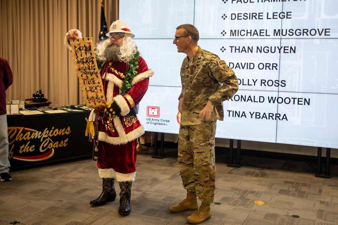 Santa Claus interrupts the U.S. Army Corps of Engineers (USACE) Galveston District's (SWG) quarterly award ceremony to congratulate the awardees and read off the names of all the employees who made this year's "nice list." 

SWG held its Fiscal Year 2024 First Quarter Awards Ceremony and Townhall at the Jadwin Building in Galveston, Texas, Dec. 14, 2023.