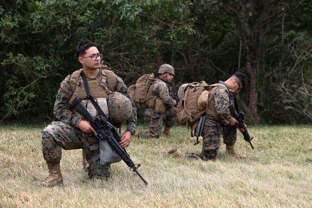 U.S. Marines with Marine Aviation Logistics Squadron (MALS) 36 post security during Stand-in Force Exercise 24 at Camp Hansen, Okinawa, Japan, Dec. 1, 2023. SIFEX 24 is a division-level exercise involving all elements of the Marine Air-Ground Task Force focused on strengthening multi-domain awareness, maneuver, and fires across a distributed airtime environment. (U.S. Marine Corps photo by Lance Cpl. Nemos Armijo)