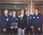 (From left to right) Captains John Martin, Joe Reidy, Jeffrey Taliaferro and Randy Kaufman stand in front of 37th Bomb Squadron aircraft number 86-0102 during Operation Desert Fox on the flightline at Thumrait Air Base, Oman, Dec. 19, 1998.