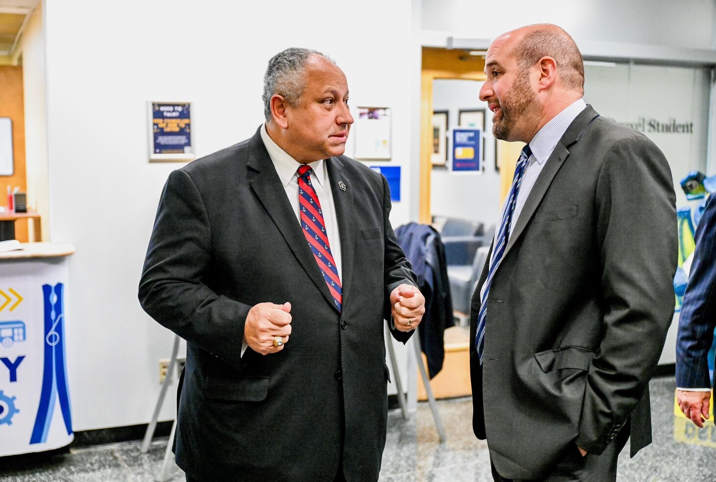 Secretary of the Navy Carlos Del Toro speaks with Pennsylvania State Secretary of the Department of Community and Economic Development Rick Siger during the NDIA Delaware Valley Chapter (NDIA-DVC) Naval Nuclear Submarine and Aircraft Carrier Suppliers’ Conference at Drexel University in Philadelphia, Dec. 14. At the conference, Secretary Del Toro urged industry and academia to join efforts to restore the Nation’s competitive shipbuilding and repair landscape.