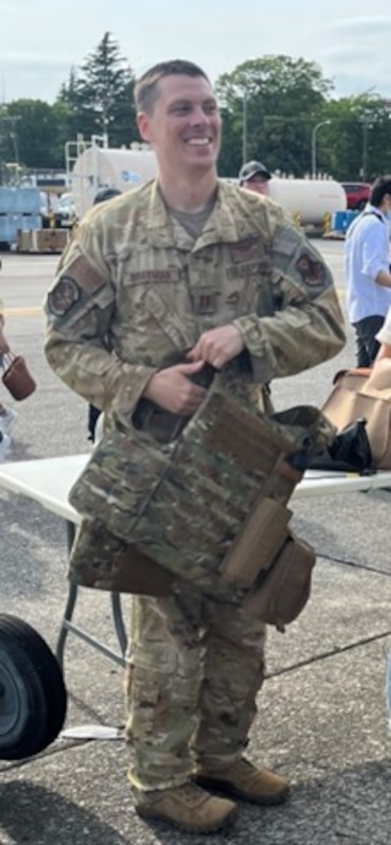 a man in air force camo walking