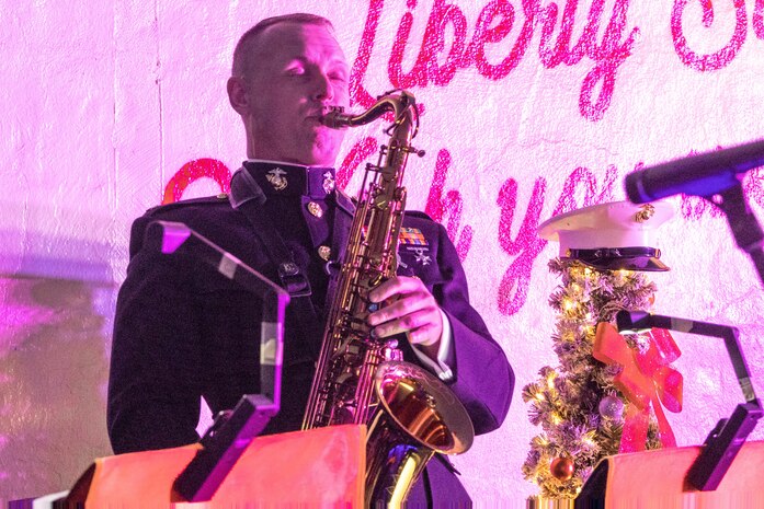 U.S. Marine Corps Chief Warrant Officer 2 Randel S. Metzinger, band officer of Marine Band San Diego, plays the saxophone during the 2023 holiday concert at Liberty Station in San Diego, Dec. 9, 2023. The concert is annual and featured Marine musicians performing a variety of holiday classics and seasonal favorites. The Marine Corps Bands inspire patriotism and represent American values through music. Metzinger is from Tacoma, Washington. (U.S. Marine Corps photo by Staff Sgt. Melissa L. Karnath)