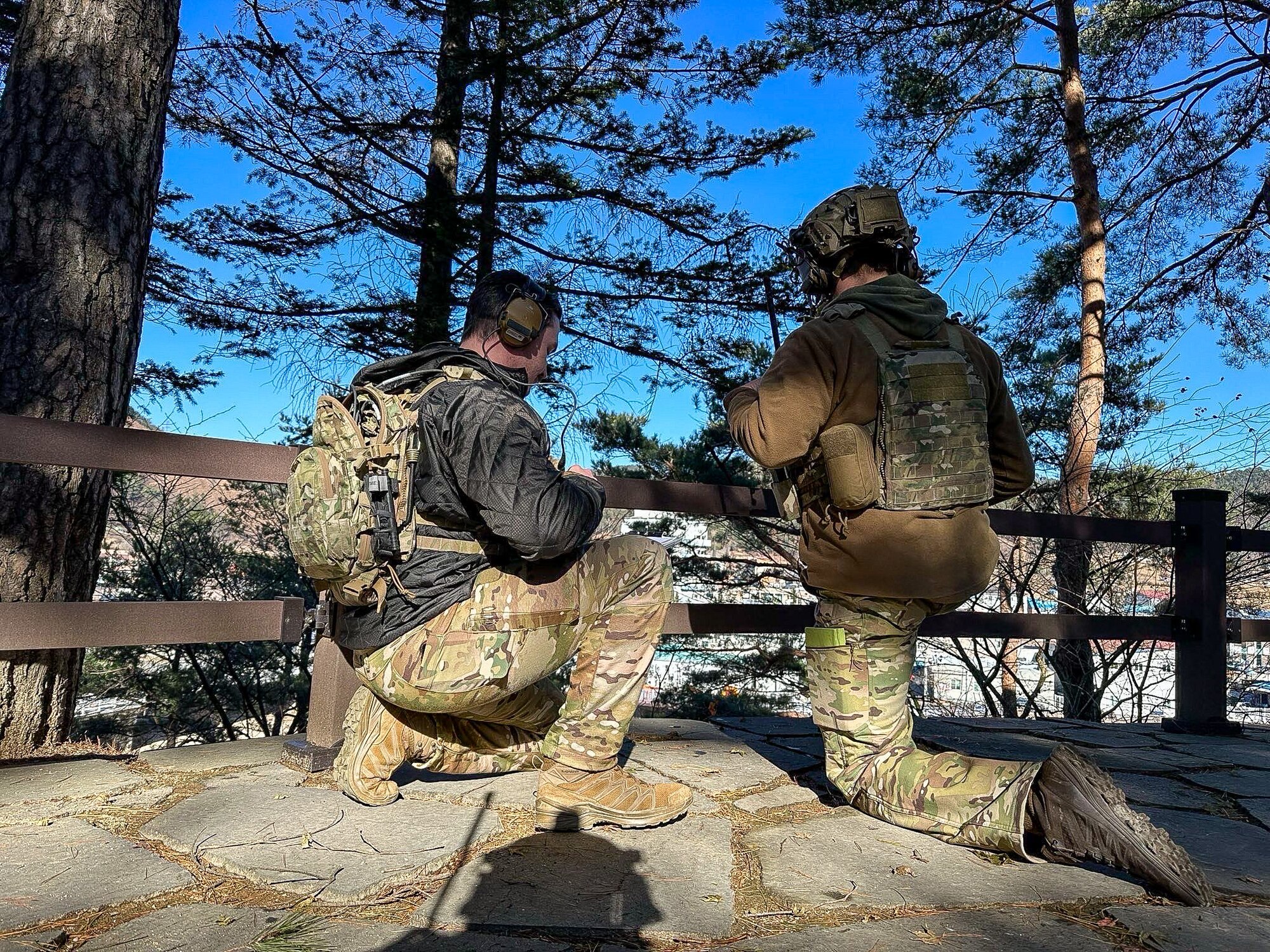 U.S. Air Force Airman 1st Class Caleb Kindler, left, and Staff Sgt. Kyle Townzen, 607th Air Support Operations Group joint terminal attack controllers, guide A-10C Thunderbolt IIs assigned to the 25th Fighter Squadron, during routine training event EPIC FOG 24-1 at an undisclosed location in the Republic of Korea, Dec. 14, 2023. A JTAC is responsible for directing combat aircraft in close air support of ground troops, ensuring precision in air strikes, significantly reducing the risk to friendly forces and increasing the effectiveness of air support in combat situations. (U.S. Air Force courtesy photo by Staff Sgt. Catherine Tenaglia)