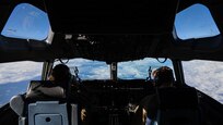 Capt. Dustin Rushnock and Capt. Sinead Kirnan fly a 105th Airlift Wing C-17 Globemaster III Nov. 18, 2023. The 105th Airlift Wing spent four months supporting aeromedical evacuation missions out of Ramstein Air Base, Germany.