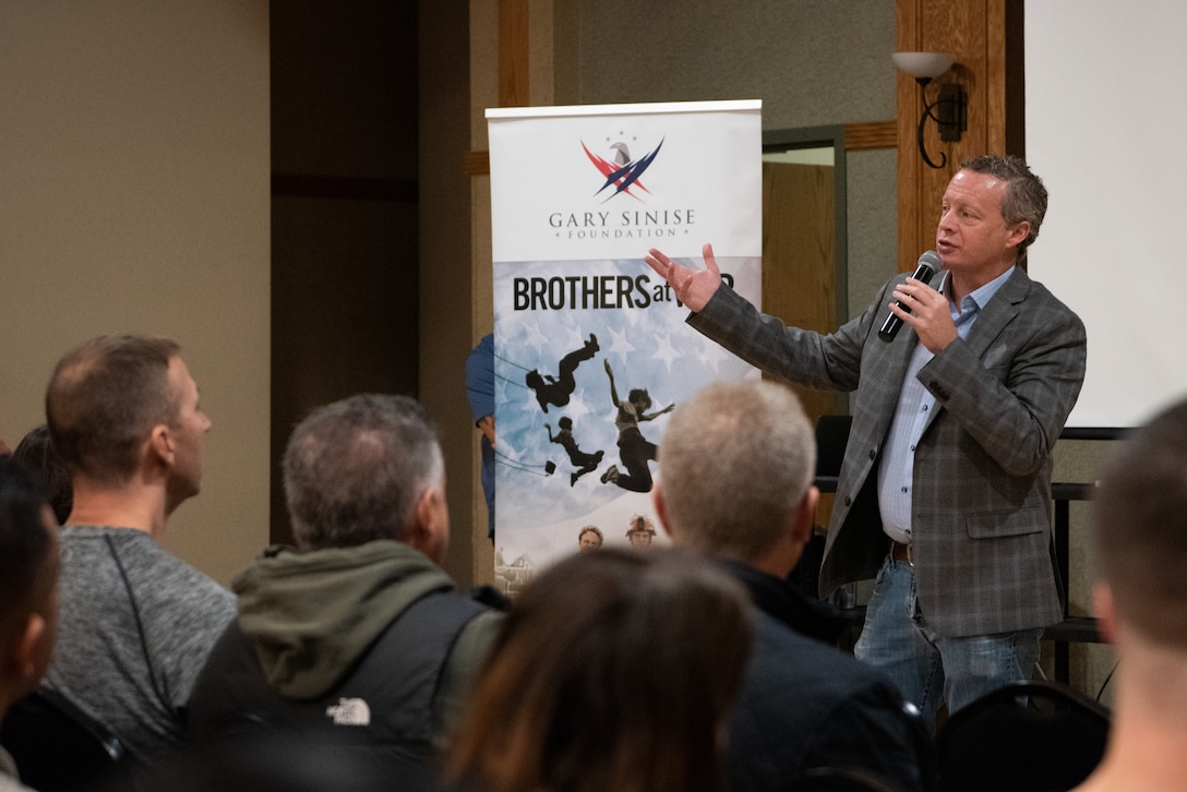 Jake Rademacher, Brothers at War documentary producer, addresses members of the 128th Air Refueling Wing during a presentation designed specifically for servicemembers to help cope with difficulties incurred from military service, Dec. 3, 2023 at the Oak Creek Community Center. The event coordinated by the Airman & Family Readiness Center served to further a sense of community and connection among wing Airmen. (U.S. Air National Guard photo by Airman Cynthia Yang)