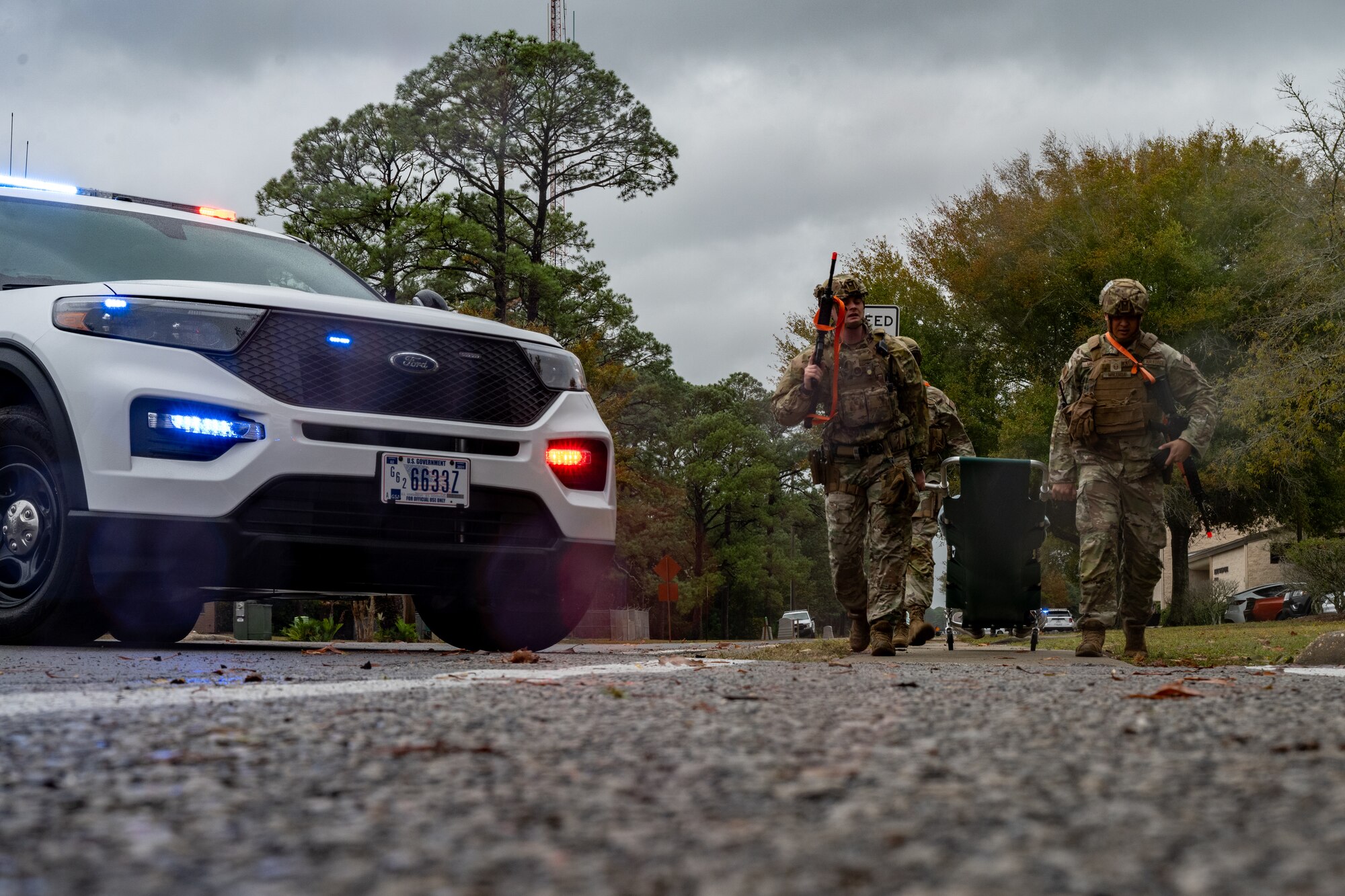 Airmen assigned to the 1st Special Operations Security Forces Squadron help a simulated injured individual during an active shooter exercise at Hurlburt Field, Florida, Nov 15, 2023. The exercise is held routinely every couple months to help Airmen get ready for real world scenarios.