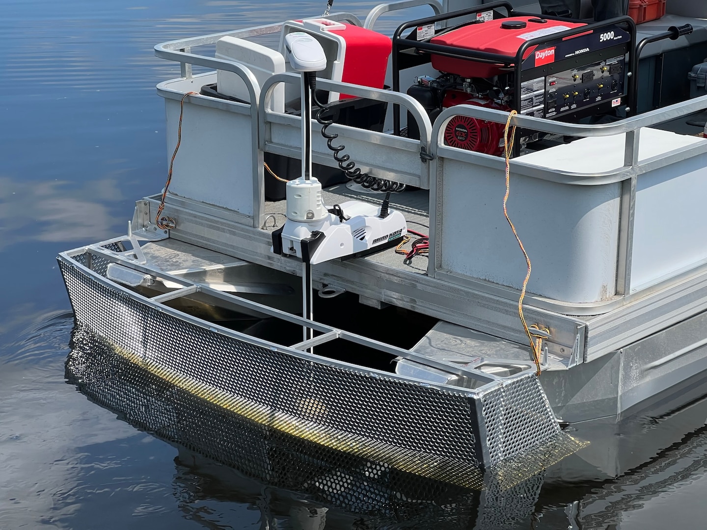 Image of bow-mounted screen and trolling motor to protect the UV reactor from debris and maximize mixing within the UVC reaction zone