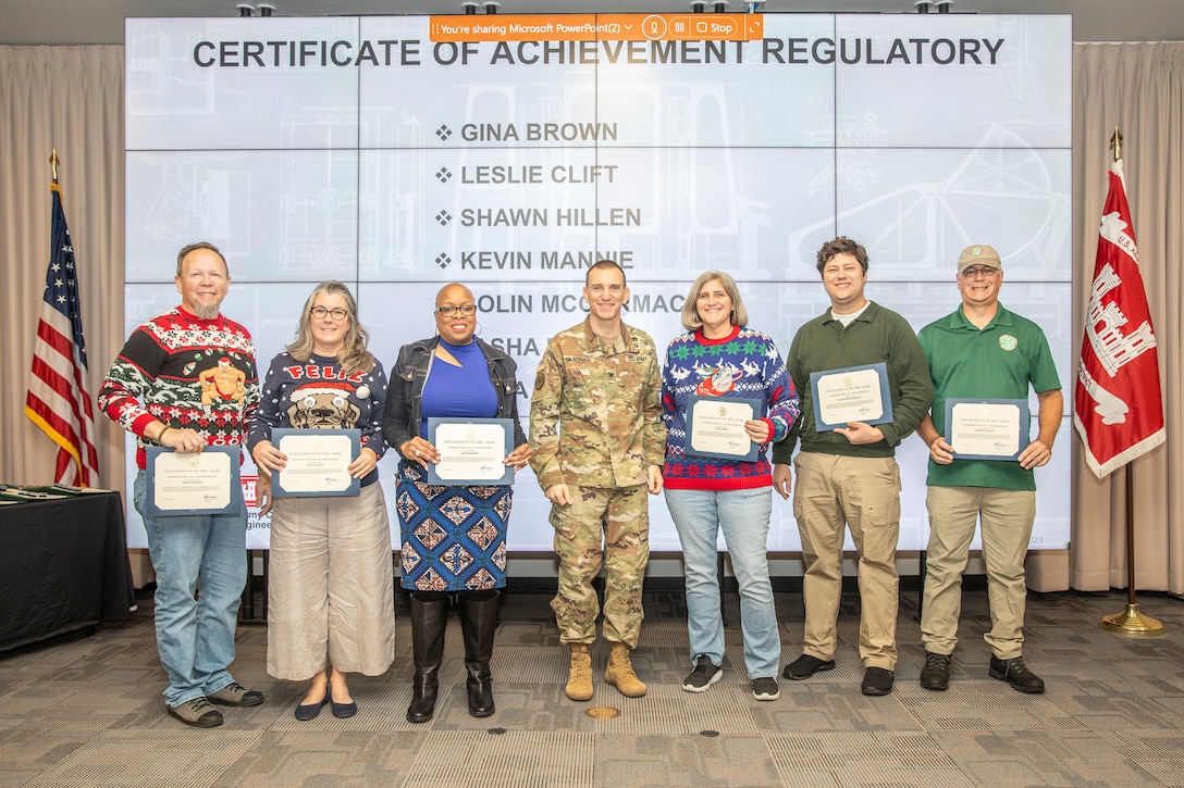 Col. Rhett Blackmon, U.S. Army Corps of Engineers (USACE) Galveston District (SWG) commander, awards member's of SWG's Regulatory Division with a certificate of achievement, Dec. 14, 2023.

Gina Brown, Leslie Clift, Shawn Hillen, Kevin Mannie, Colin McCormack, Tasha Metz, and Kara Vick were recognized for their contributions to planning and executing the annual regulatory outreach event.