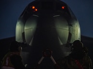 Airmen assigned to the 5th Aircraft Maintenance Squadron (AMXS) prepare a B-52H Stratofortress for SURGE Week on the flight line at Minot Air Force Base, North Dakota, Dec. 12, 2023. Crew chiefs assigned to the 5th AMXS make sure every aircraft is fully operational for its next flight from landing to takeoff. (U.S. Air Force photo by Airman 1st Class Alyssa Bankston)