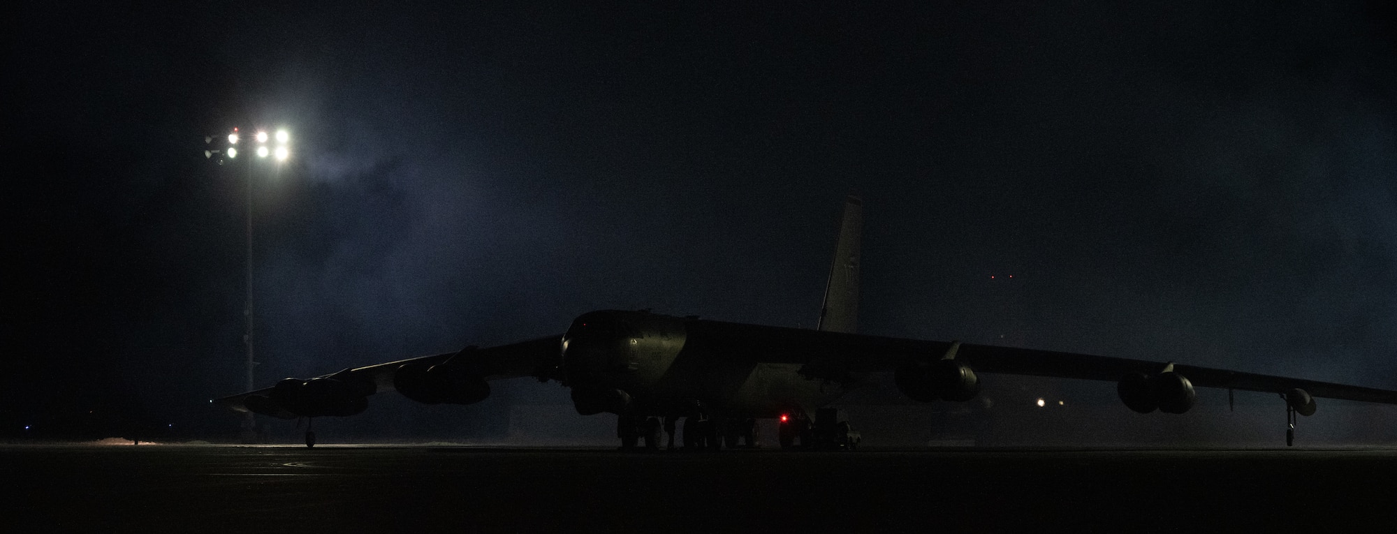 A B-52H Stratofortress, assigned to the 23rd Bomb Squadron, idles on the flight line during SURGE Week at Minot Air Force Base, North Dakota, Dec. 12, 2023. From Dec. 12 - Dec. 14, the 5th Bomb Wing hosted SURGE Week, launching multiple aircraft in the sky as quickly as possible. (U.S. Air Force photo by Airman 1st Class Alyssa Bankston)