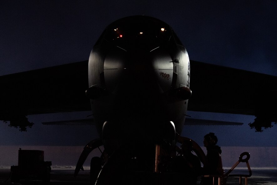 Airmen assigned to the 5th Aircraft Maintenance Squadron (AMXS) prepare a B-52H Stratofortress assigned to the 69th Bomb Squadron for SURGE Week on the flight line at Minot Air Force Base, North Dakota, Dec. 12, 2023. Crew chiefs assigned to the 5th AMXS make sure every aircraft is fully operational for its next flight from landing to takeoff. (U.S. Air Force photo by Airman 1st Class Alyssa Bankston)