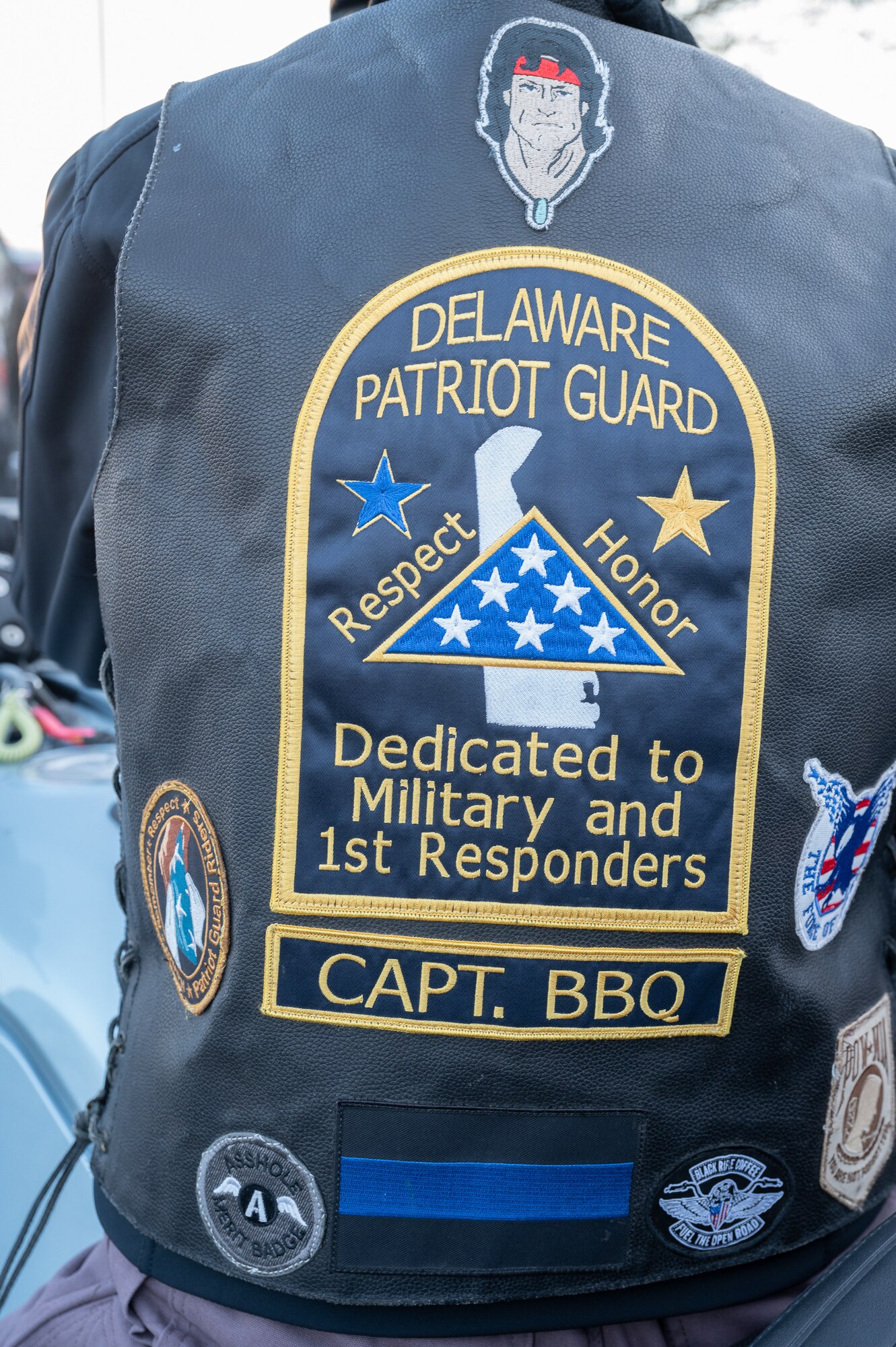 Janet Rambo, member of the Delaware Patriot Guard participates in the Wreaths Across America Parade at the Harrington Fire House near Dover Air Force Base, Delaware, Dec. 14, 2023. The motorcycle club led the motorcade as it traveled through Delaware. (U.S. Air Force photo by Mauricio Campino)