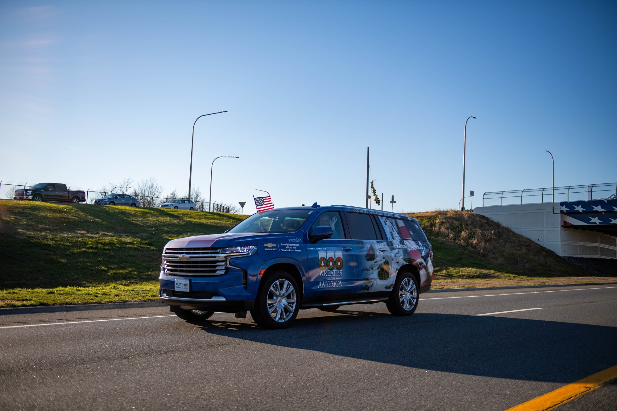 The Wreaths Across America Parade crosses under the Old Lebanon bridge near Dover Air Force Base, Delaware, Dec. 14, 2023. The mission of WAA is to honor those who served while teaching the next generation the value of freedom. (U.S. Air Force photo by Tech. Sgt. J.D. Strong II)