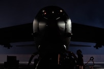 Airmen assigned to the 5th Aircraft Maintenance Squadron (AMXS) prepare a B-52H Stratofortress assigned to the 69th Bomb Squadron for SURGE Week on the flight line at Minot Air Force Base, North Dakota, Dec. 12, 2023. Crew chiefs assigned to the 5th AMXS make sure every aircraft is fully operational for its next flight from landing to takeoff. (U.S. Air Force photo by Airman 1st Class Alyssa Bankston)