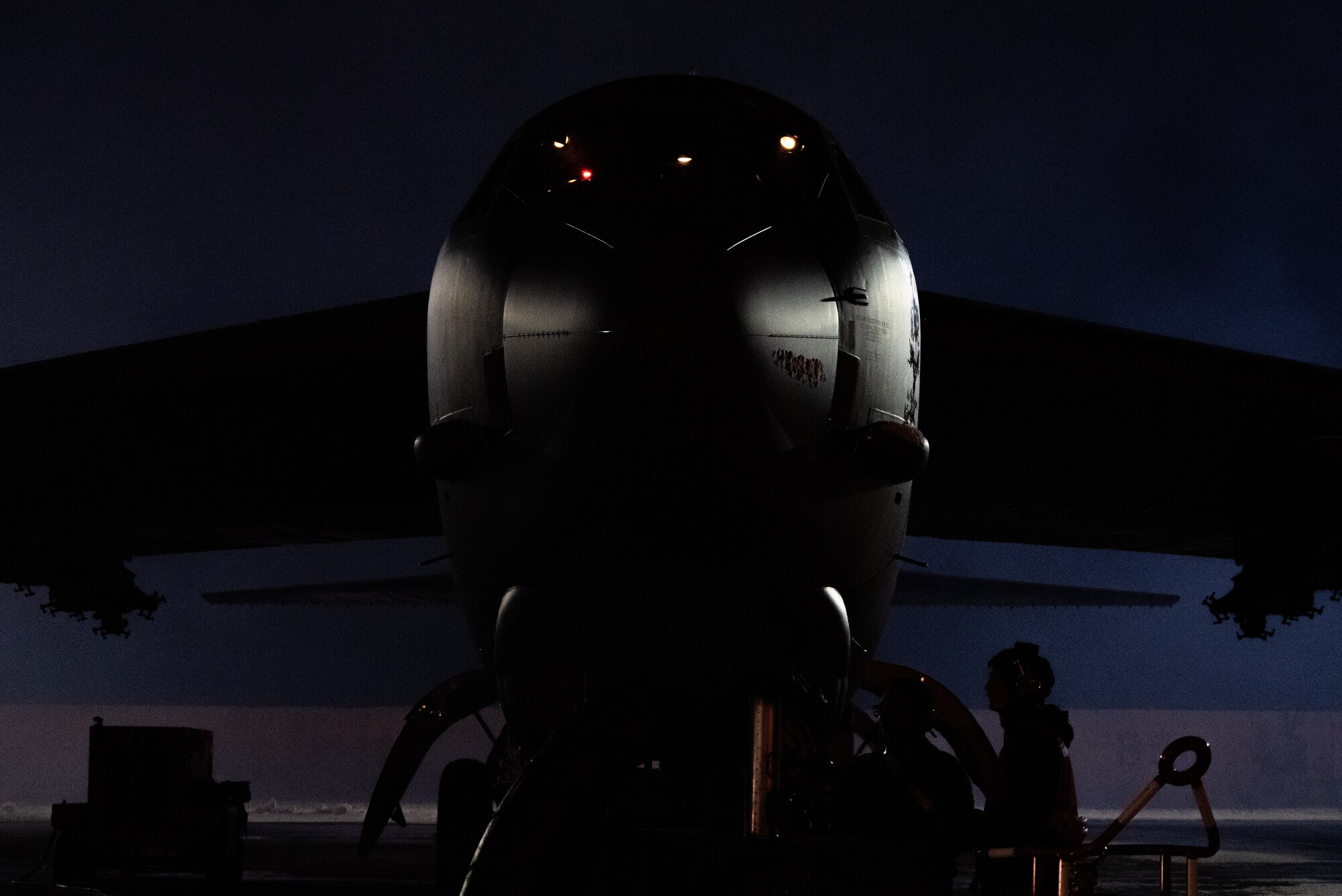 Airmen assigned to the 5th Aircraft Maintenance Squadron (AMXS) prepare a B-52H Stratofortress assigned to the 69th Bomb Squadron for SURGE Week on the flight line at Minot Air Force Base, North Dakota, Dec. 12, 2023. Crew chiefs assigned to the 5th AMXS make sure every aircraft is fully operational for its next flight from landing to takeoff. (U.S. Air Force photo by Airman 1st Class Alyssa Bankston)