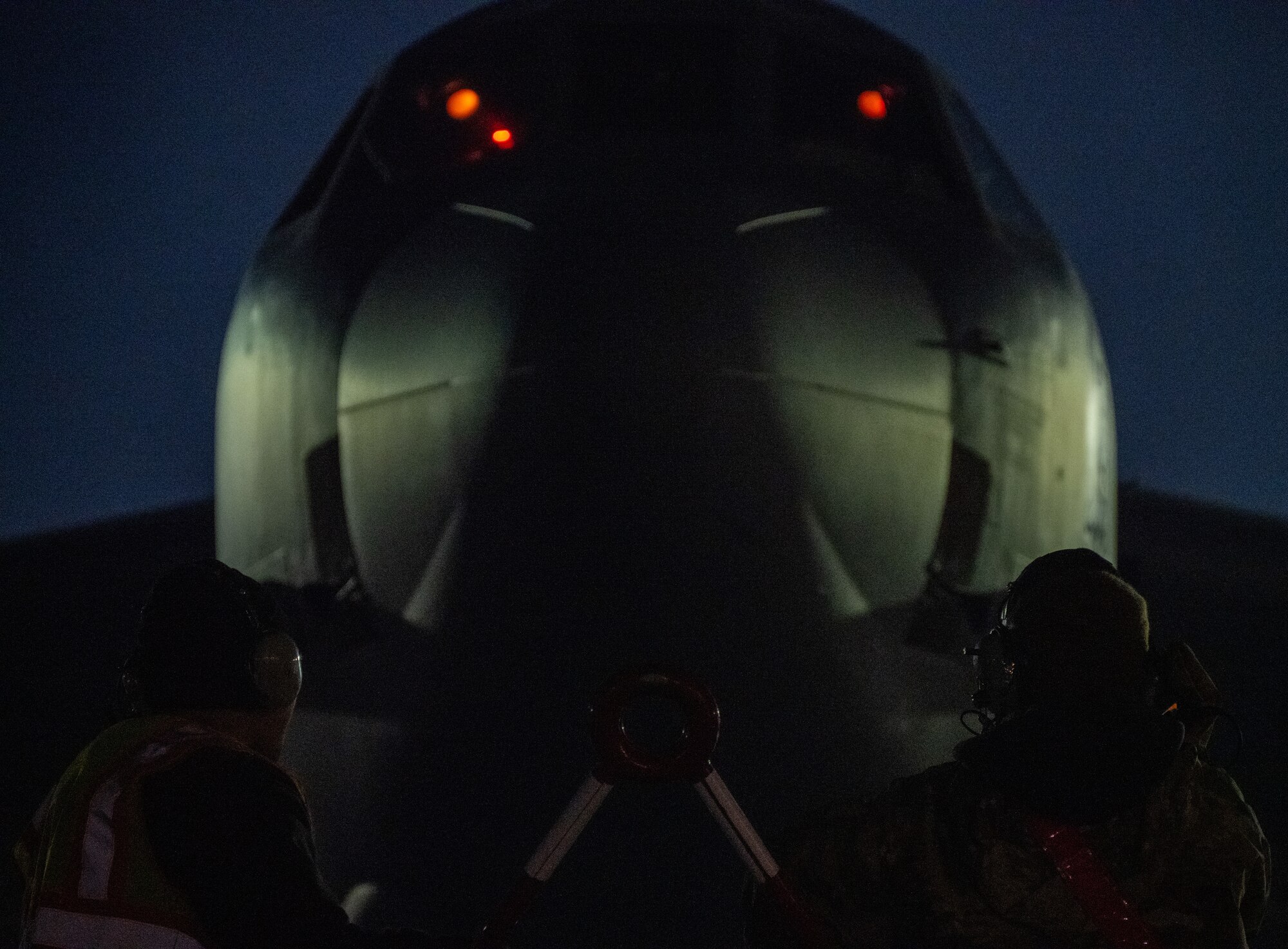 Airmen assigned to the 5th Aircraft Maintenance Squadron (AMXS) prepare a B-52H Stratofortress for SURGE Week on the flight line at Minot Air Force Base, North Dakota, Dec. 12, 2023. Crew chiefs assigned to the 5th AMXS make sure every aircraft is fully operational for its next flight from landing to takeoff. (U.S. Air Force photo by Airman 1st Class Alyssa Bankston)