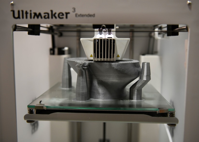 A 3D printer prints a multiday project at Joint Base Andrews, Md., Dec. 1, 2023.