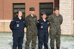 Delegates from the Brazilian Navy and Air Force brave the winter weather at Niagara Falls Air Reserve Station Dec. 6, 2023. Representatives spent the week learning from 222nd Command and Control Squadron members how to enhance and develop space operations.