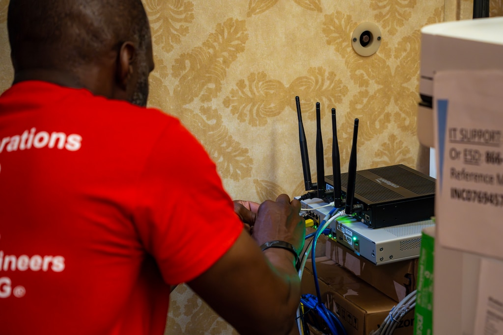 Terrence Stitt with the U.S. Army Corps of Engineers Enterprise Emergency Response Team prepares a router at the Emergency Field Office during a move to a new location. The Logistics Planning and Response Team along with the EERT collaborate with businesses to obtain locations with sufficient resources to support recovery operations.
