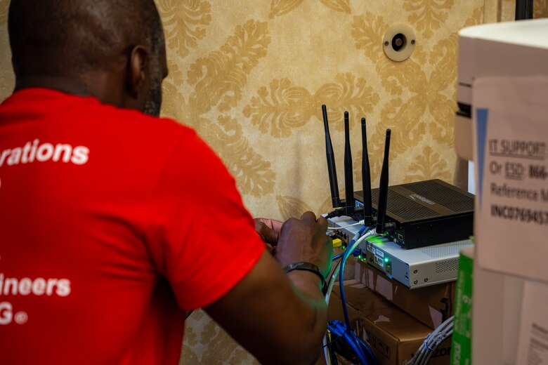 Terrence Stitt with the U.S. Army Corps of Engineers Enterprise Emergency Response Team prepares a router at the Emergency Field Office during a move to a new location. The Logistics Planning and Response Team along with the EERT collaborate with businesses to obtain locations with sufficient resources to support recovery operations.
