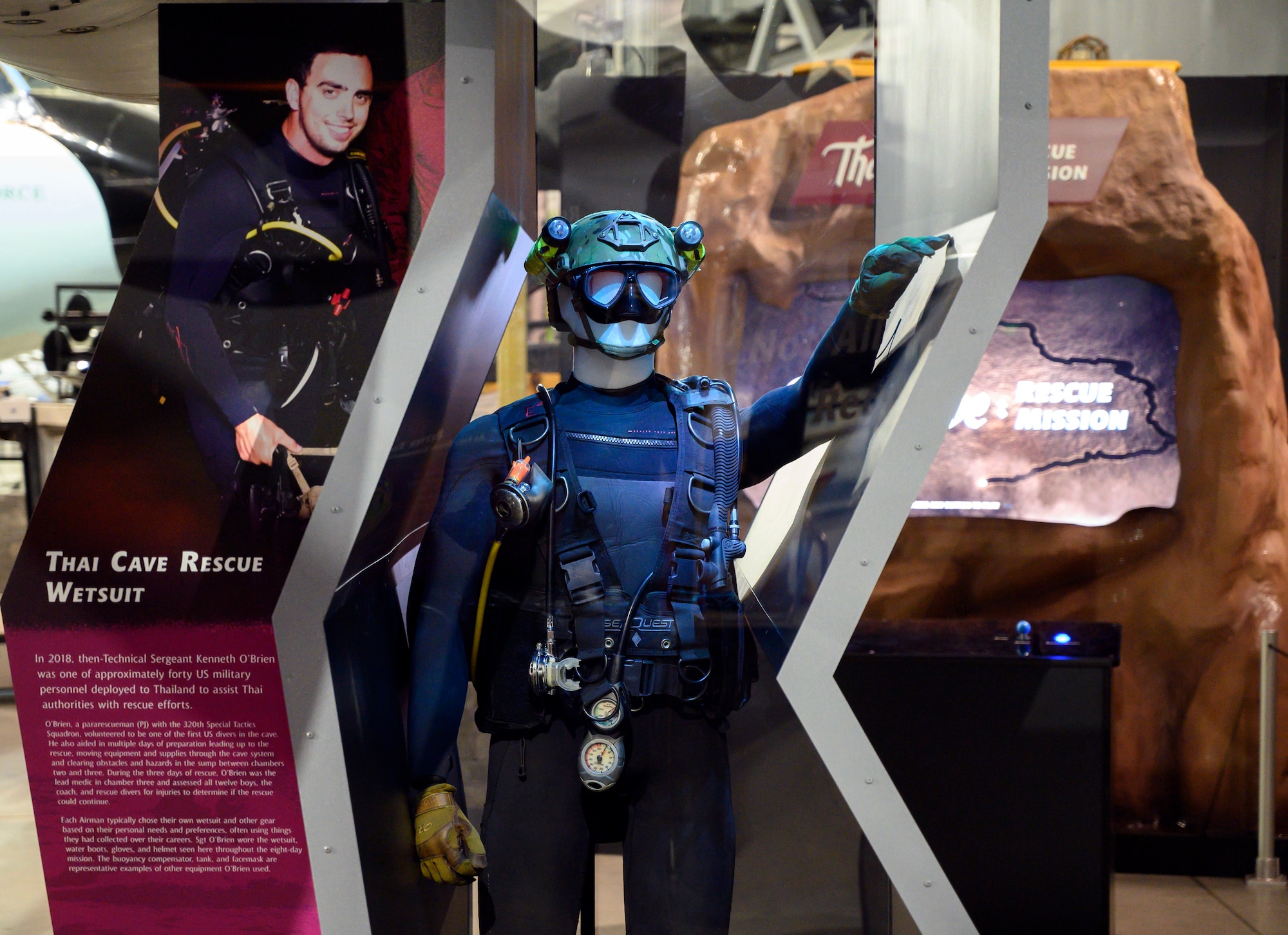 Image of Master Sgt. O'Brien's wetsuit in a manufactured tunnel to demonstrate the narrow size and irregular shape of the Thai caves.