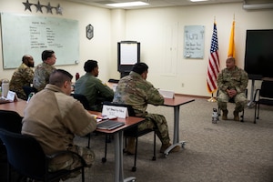 A group of students sit in a class.