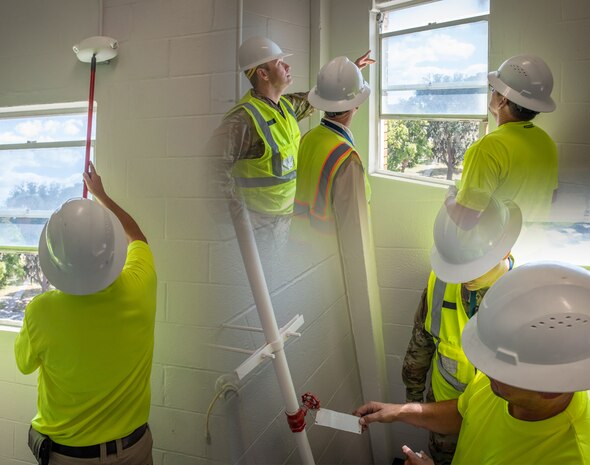 Members from the Naval Surface Warfare Center Panama City Division Infrastructure Division (NSWC PCD) conduct safety inspections during a stairwell renovation project, Oct. 25. This division is staffed by more than 40 personnel ranging from civilians to contractors to military service members from the Personnel Force Innovation Program who directly impact the personnel, projects and systems that help keep U.S. service members safe. (U.S. Navy photos by Anthony Powers)