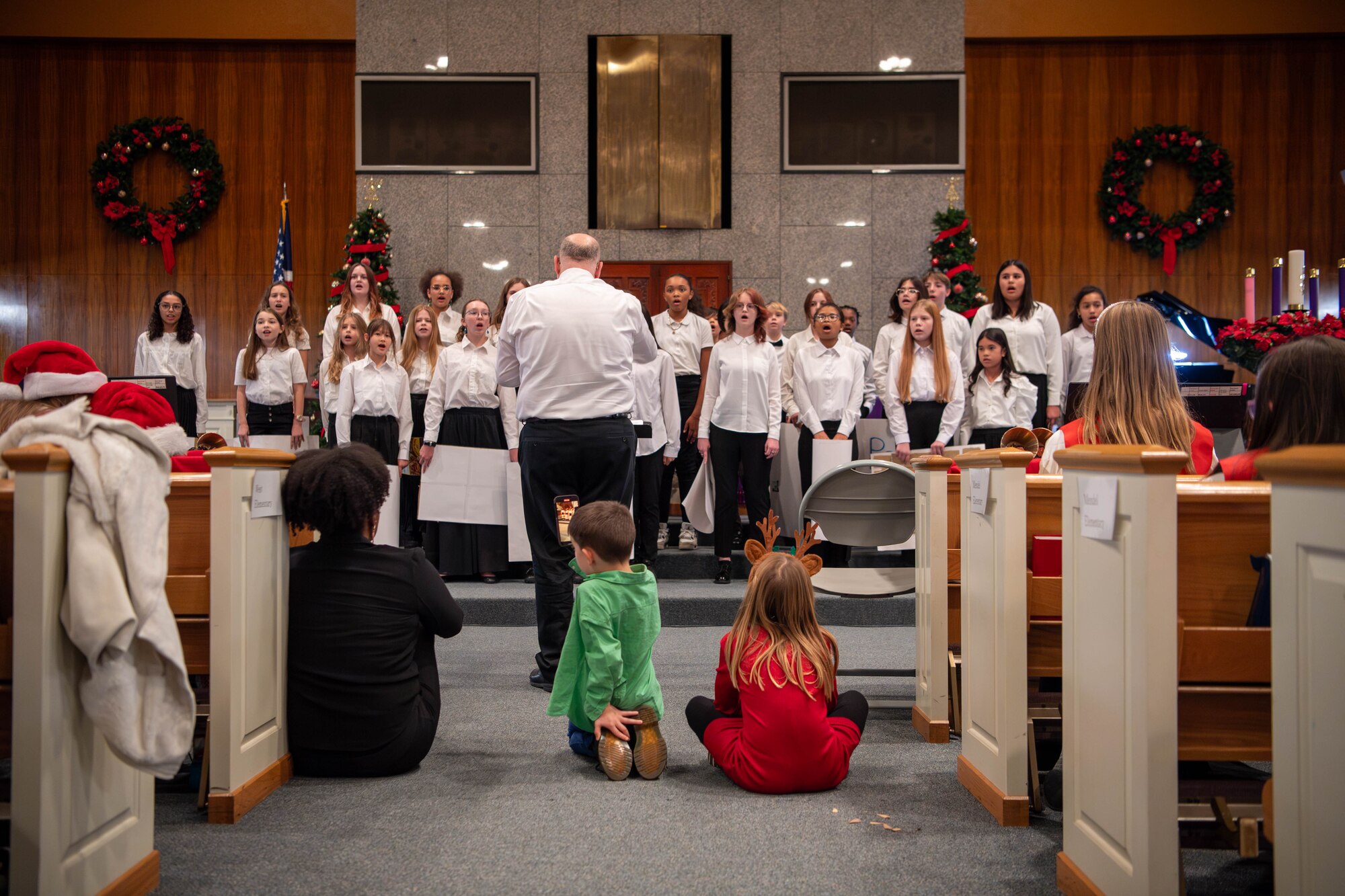 Students from the Yokota Middle School choir perform during a holiday cantata in the main chapel at Yokota Air Base, Japan.