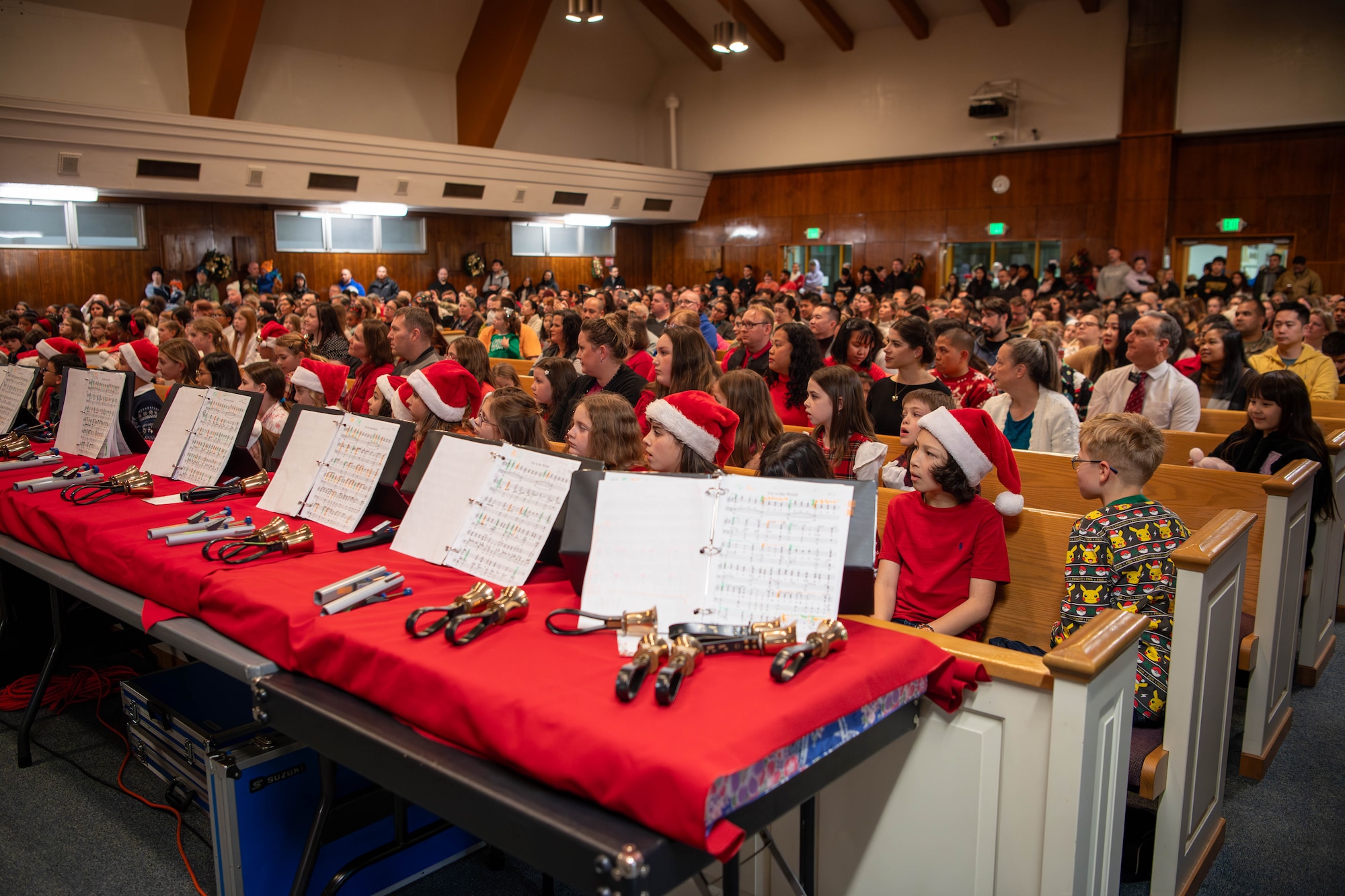 Attendees watch a choir performance during a holiday cantata in the main chapel at Yokota Air Base, Japan.