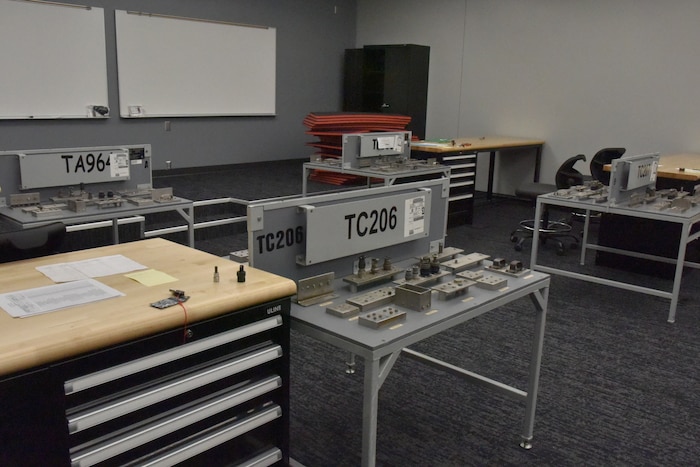 Tool trainers and tool boxes in a classroom>