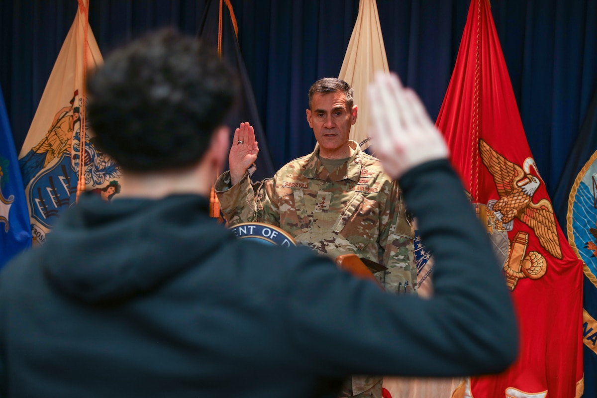 Air Force Lt. Gen. Marc Sasseville, vice chief of the National Guard Bureau, administers the Oath of Enlistment to New York National Guard enlistees at the Fort Hamilton Military Enlistment Processing Station, Brooklyn, New York, Dec. 13, 2023. Sasseville visited New York Guardsmen at multiple locations across the city.