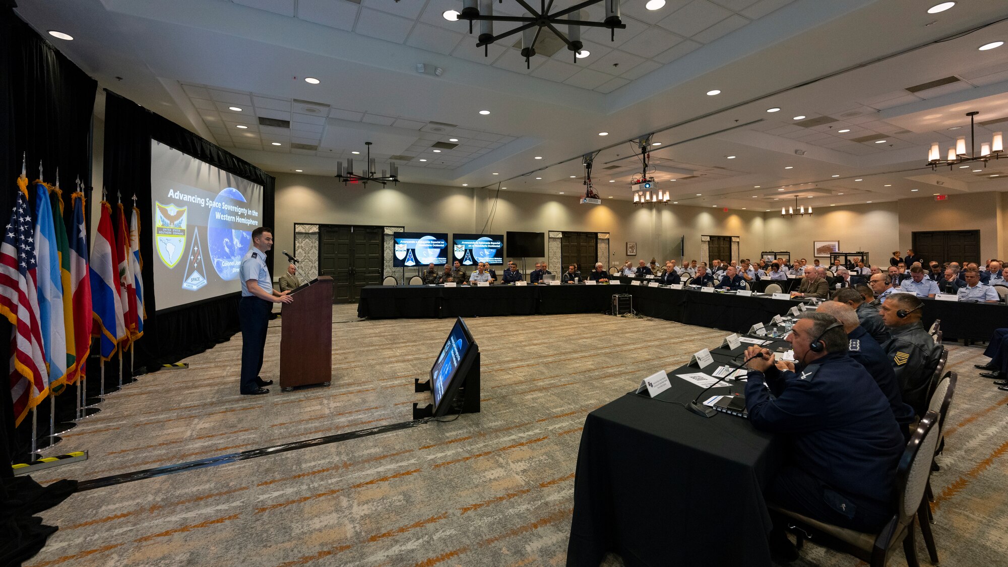 U.S. Air Force Col. Jonathan Whitaker, 12th Air Force (Air Forces Southern) director of Space Forces, gives a briefing during the South American Air Chiefs Conference in Tucson, Ariz. Dec. 5, 2023.