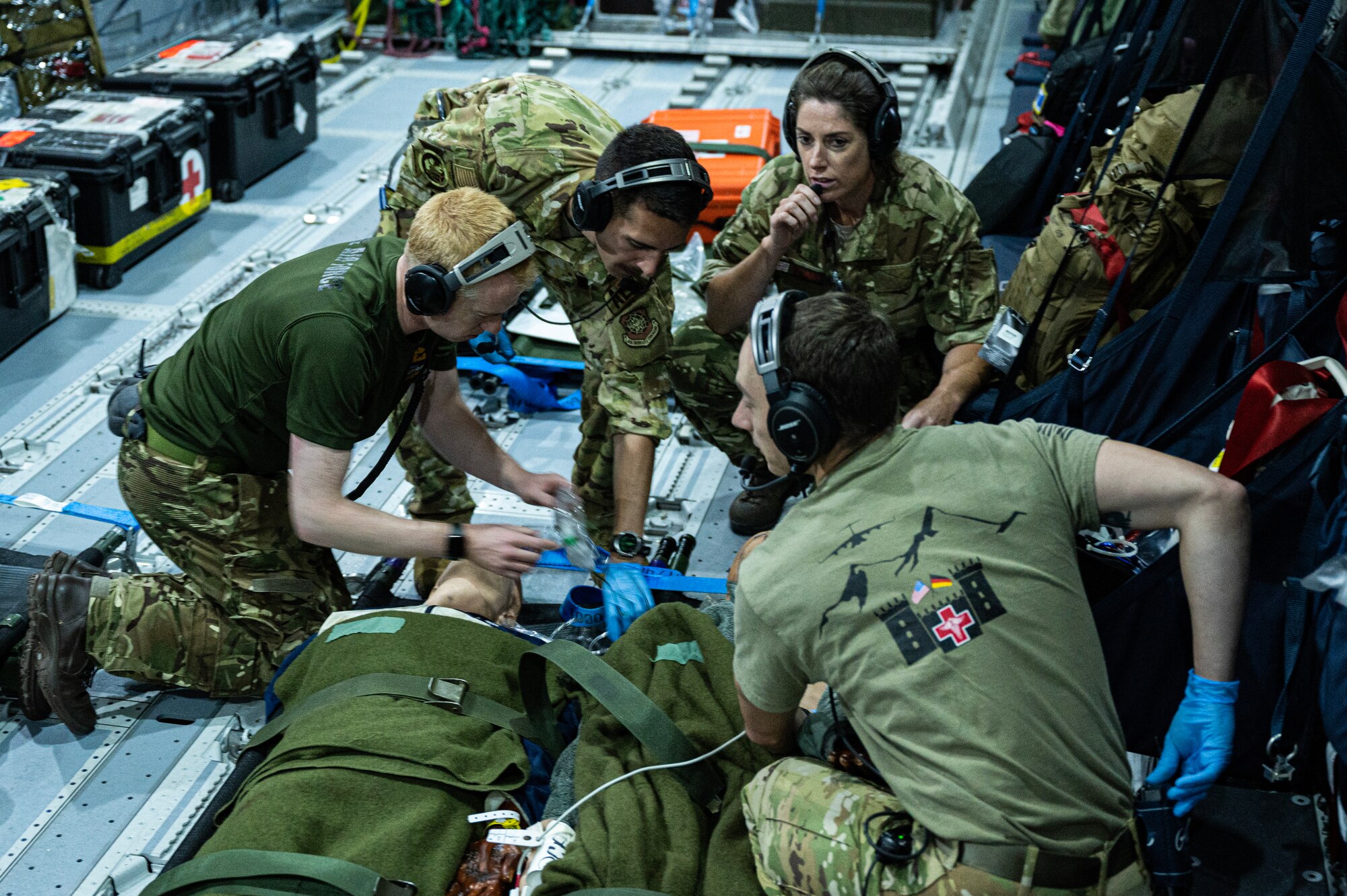 Royal Air Force Airmen and U.S. Airmen assigned to the 375th AES conduct a joint medical training on a RAF A400M Atlas over Andersen Air Force Base Guam, July 14, 2023, for Exercise Mobility Guardian 2023. MG23 is a multilateral exercise involving joint foreign partners to showcase coalition ability in the INDOPACOM area of responsibility. (U.S. Air Force photo by Staff Sgt. Devin M. Rumbaugh)