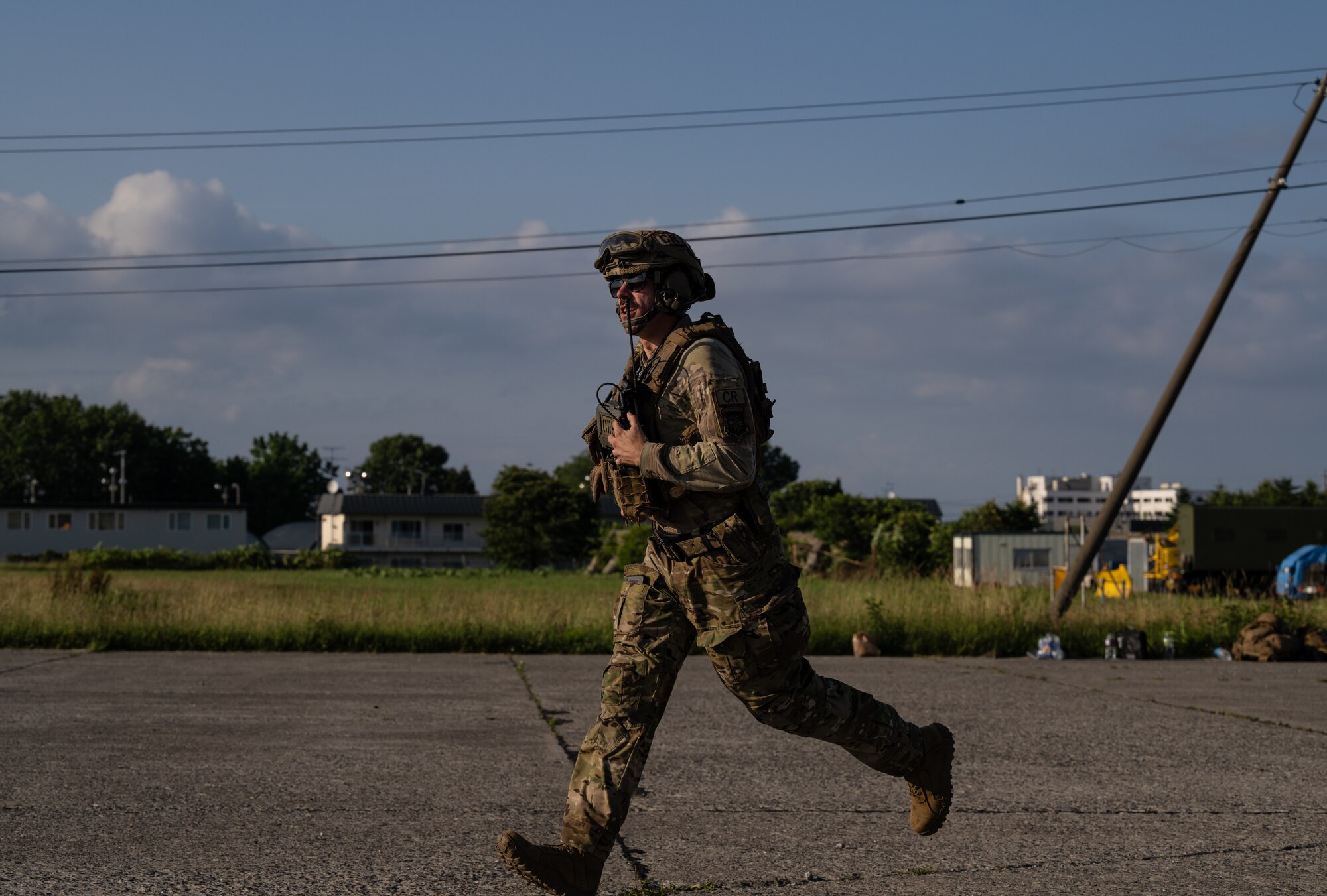 An operator assigned to the 821st Contingency Response Squadron sprints on the flight line at Yakumo Sub Base Japan, July 10, 2023 in support of Mobility Guardian 2023. A multilateral endeavor, MG23 features seven participating countries – Australia, Canada, France, Japan, New Zealand, United Kingdom, and the United States – operating approximately 70 mobility aircraft across multiple locations spanning a 3,000 mile exercise area from July 5th through July 21. Our Allies and partners are one of our greatest strengths and a key strategic advantage. MG23 is an opportunity to deepen our connections with regional Allies and partners using bold initiatives. (U.S. Air Force photo by Tech. Sgt. Alexander Cook)