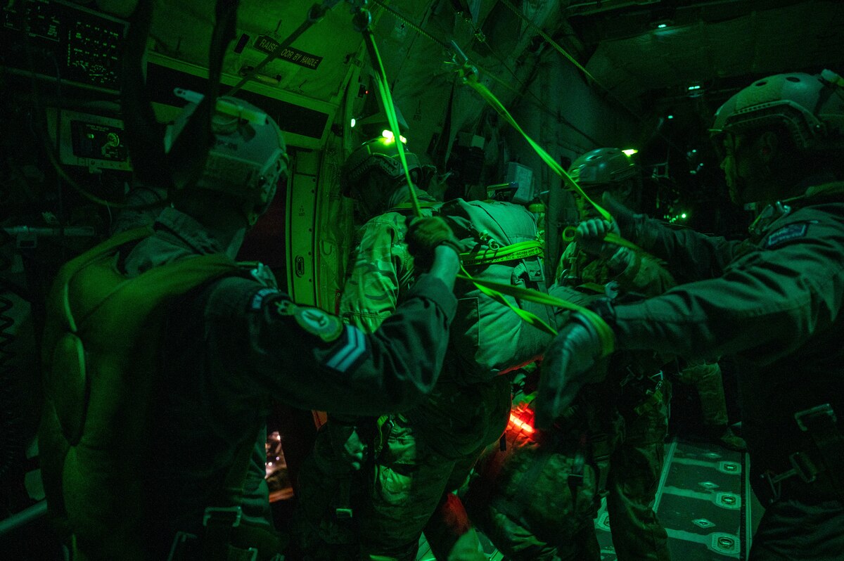 Paratroopers prepare for static line jumps over Auckland, New Zealand.