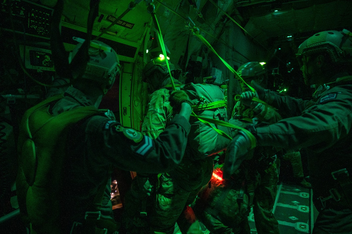 Paratroopers prepare for static line jumps over Auckland, New Zealand.