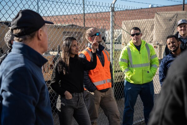 Sheryll Impellizzeri leads group discussion with members of the National Roofing Program