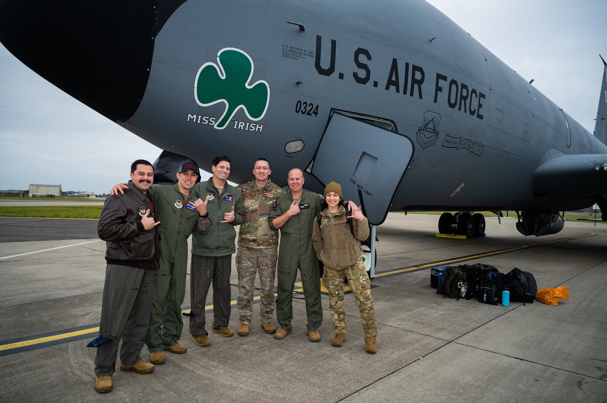 A U.S. Air Force aircrew assigned to the 351st Air Refueling Squadron and 100th Air Refueling Wing pose for a group photo after conducting the first low-altitude flying KC-135 Stratotanker mission, at Royal Air Force, Mildenhall, England, Dec. 15, 2023. This was the first low-altitude flying mission conducted by the 351st ARS, demonstrating the capabilities and readiness of the aircraft and aircrew.