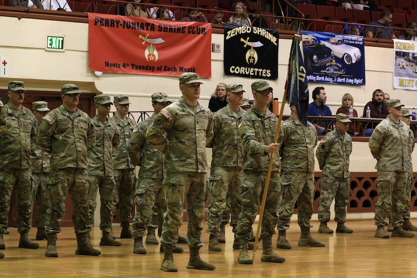 Soldiers with 2nd Battalion, 112th Infantry Regiment, 56th Stryker Brigade Combat Team, 28th Infantry Division and their families are recognized during a ceremony at the Zembo Shrine Auditorium in Harrisburg, Pennsylvania, Dec. 17, 2023. The Soldiers will leave their homes and families for about a year as they deploy to the Horn of Africa, supporting U.S. Africa Command and partner forces with security objectives in the region. During the ceremony, Gov. Josh Shapiro, Maj. Gen. Mark Schindler, Col. Christopher Costello and Lt. Col. Eric Ponzek shared remarks. (U.S. Army National Guard photo by Maj. Travis Mueller)