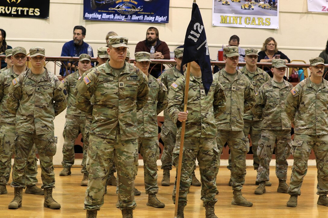 Soldiers with 2nd Battalion, 112th Infantry Regiment, 56th Stryker Brigade Combat Team, 28th Infantry Division and their families are recognized during a ceremony at the Zembo Shrine Auditorium in Harrisburg, Pennsylvania, Dec. 17, 2023. The Soldiers will leave their homes and families for about a year as they deploy to the Horn of Africa, supporting U.S. Africa Command and partner forces with security objectives in the region. During the ceremony, Gov. Josh Shapiro, Maj. Gen. Mark Schindler, Col. Christopher Costello and Lt. Col. Eric Ponzek shared remarks. (U.S. Army National Guard photo by Maj. Travis Mueller)